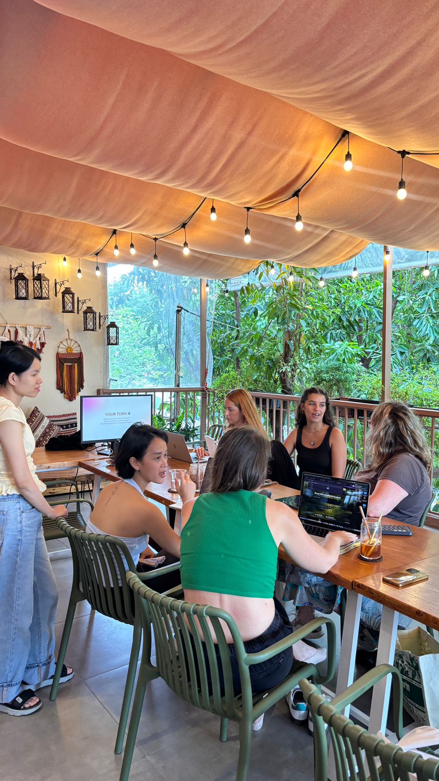 Kyla with speaker at an Internet Girls meetup in Hoi An